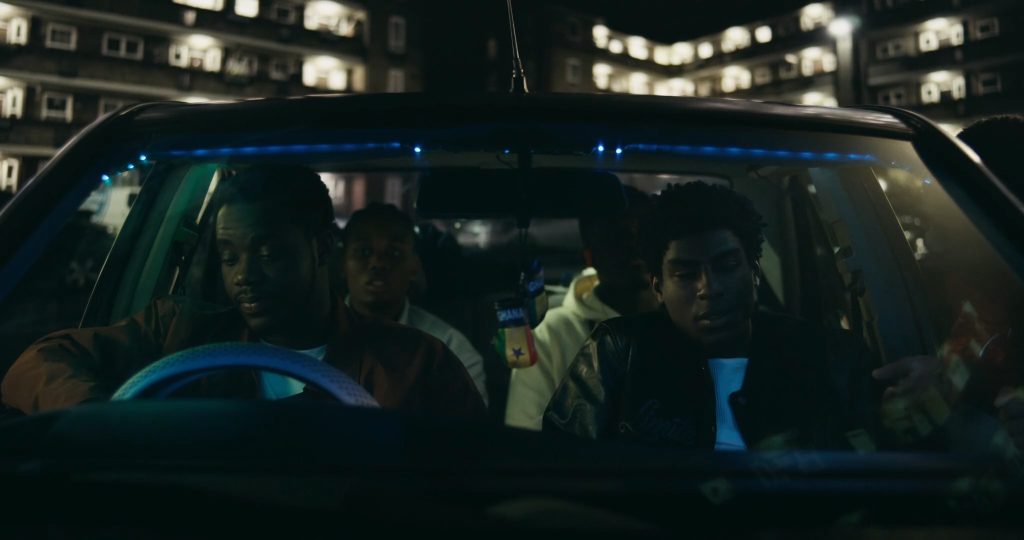 Josh Tedeku as Jamal behind the wheel of his first car in Remi R.M. Moses’ British short film Hindsight.