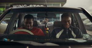 Josh Tedeku as Jamal behind the wheel of his first car in Remi R.M. Moses’ British short film Hindsight.