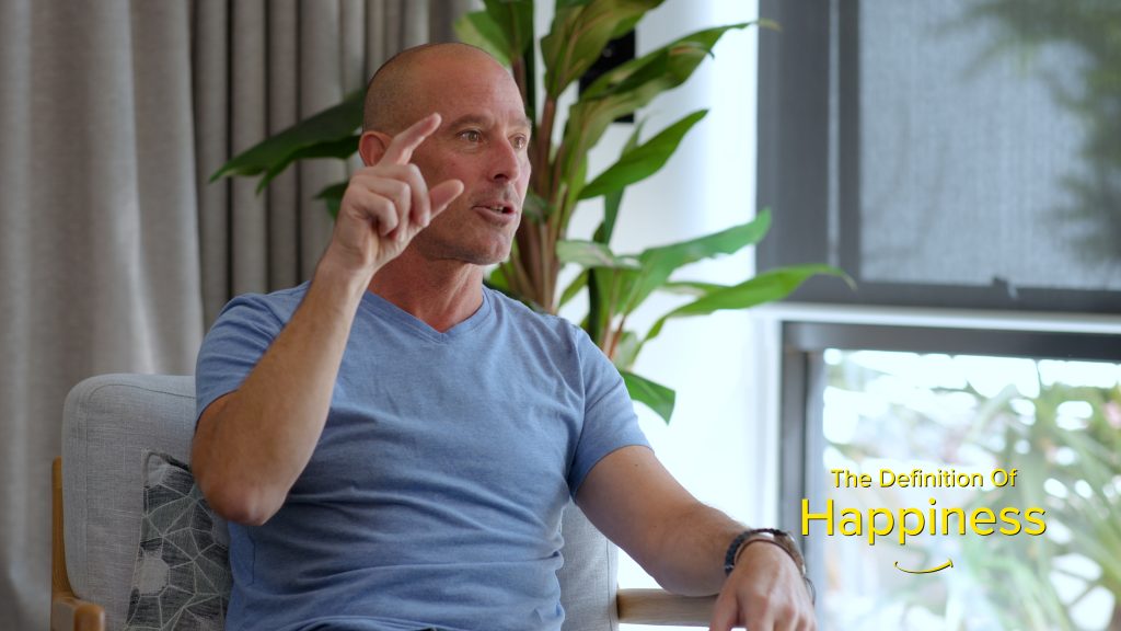 Tim Elwin explores the meaning of happiness and wellbeing in the documentary The Definition of Happiness.